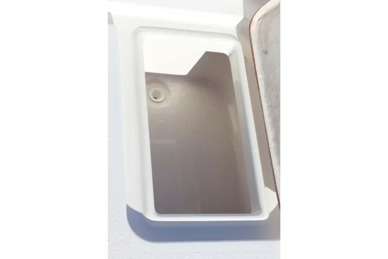 Slide: The Image of Open storage compartment on a 2017 Bulls Bay 2000 boat, showcasing interior space. - 14