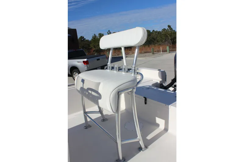 Slide: The Image of White cushioned seat on 2017 Bulls Bay 2000 boat, with stainless steel frame. - 5