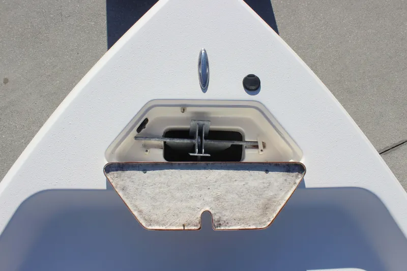Slide: The Image of Bow storage compartment of a 2017 Bulls Bay 2000 boat, featuring an anchor holder. - 8