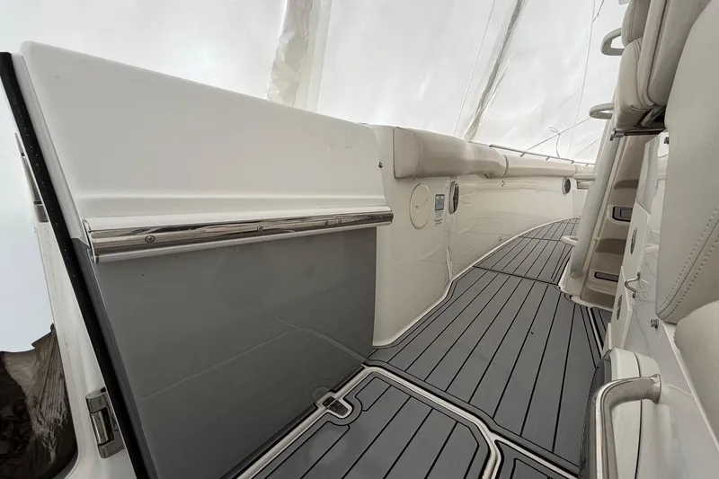 Slide: The Image of 2018 Boston Whaler 330 Outrage interior with sleek design and modern features. - 10