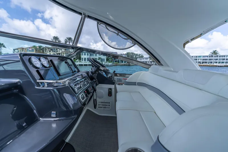 Slide: The Image of 2022 Formula 40 PC yacht interior with modern dashboard and luxurious seating. - 17