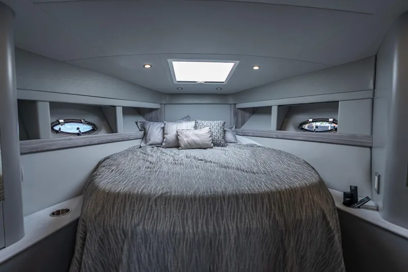 Slide: The Image of Luxurious cabin interior of 2022 Formula 40 PC yacht with elegant bedding and modern design. - 31
