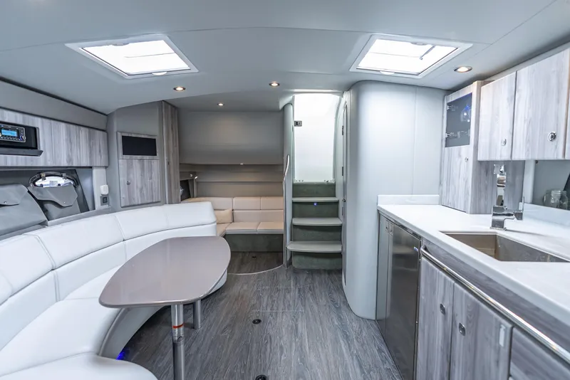 Slide: The Image of Luxurious interior of 2022 Formula 40 PC yacht with modern kitchen and seating area. - 34