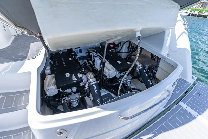 Slide: The Image of Engine compartment of a 2022 Formula 40 PC boat, showcasing dual engines and mechanical components. - 46