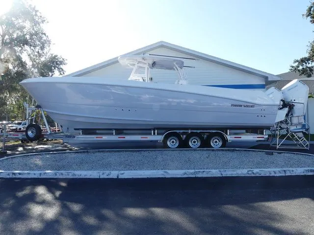 Slide: The Image of Twin Vee 340 Center Console GFX 2026 - 2