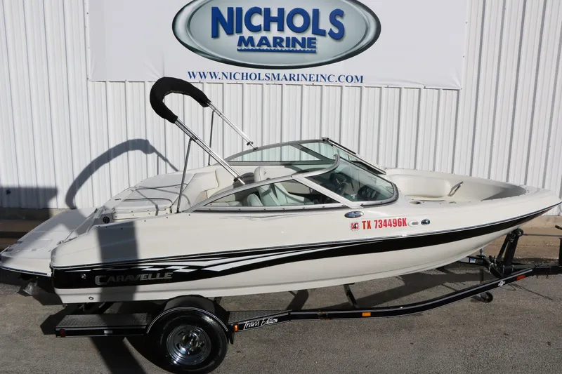 Slide: The Image of 2004 Caravelle 187 Fish & Ski boat on trailer at Nichols Marine. - 12
