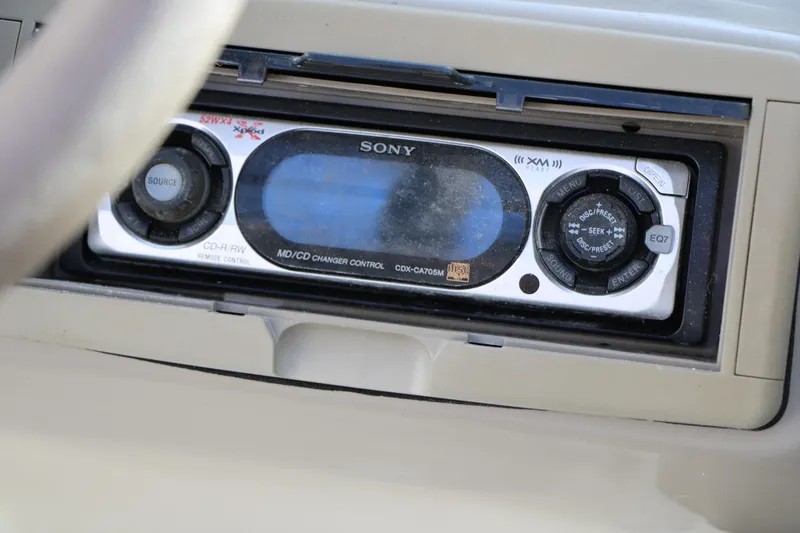 Slide: The Image of Sony stereo system in a 2004 Caravelle 187 Fish & Ski boat dashboard. - 26