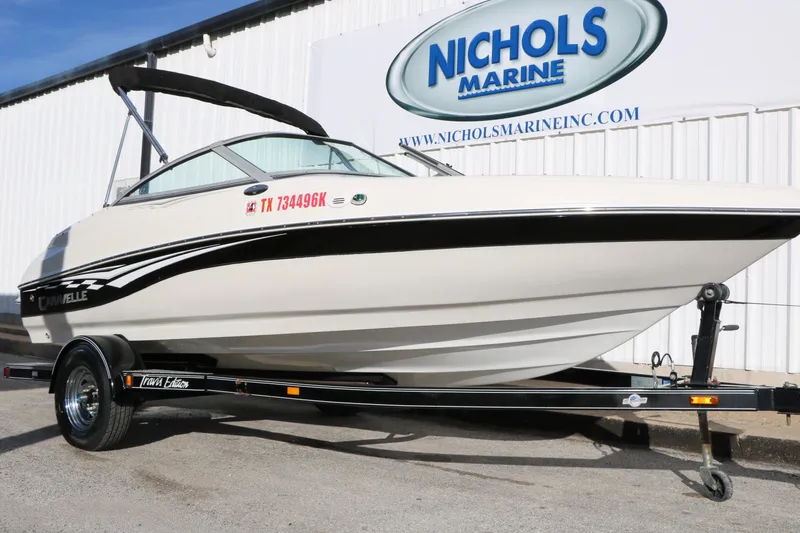 Slide: The Image of 2004 Caravelle 187 Fish & Ski boat on trailer at Nichols Marine. - 5