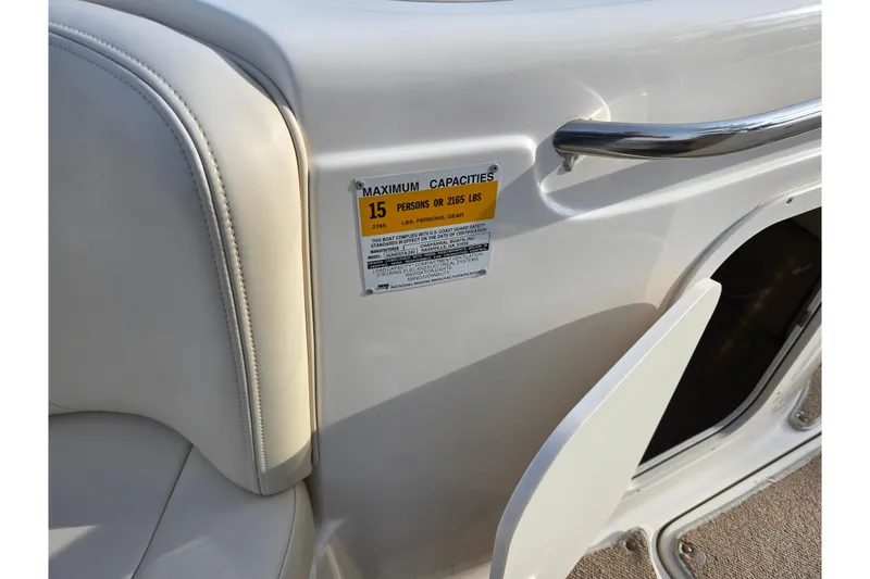 Slide: The Image of 2002 Chaparral Sunesta 242 boat capacity label, seating for 15 people or 2165 lbs. - 12