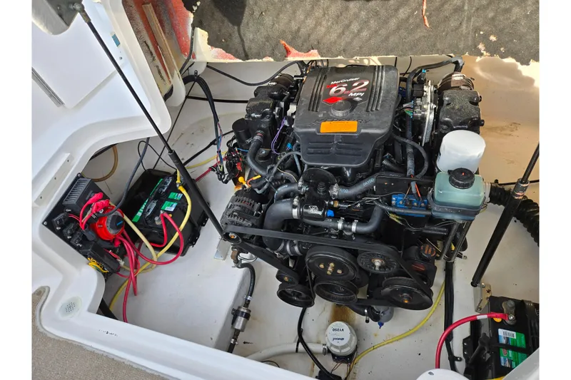 Slide: The Image of Engine compartment of a 2002 Chaparral Sunesta 242 boat with MerCruiser 6.2 MPI engine. - 25