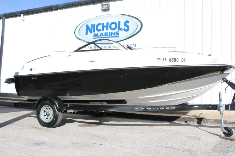 The Image of 2017 Bayliner 195 Deck Boat on trailer at Nichols Marine dealership. - 1
