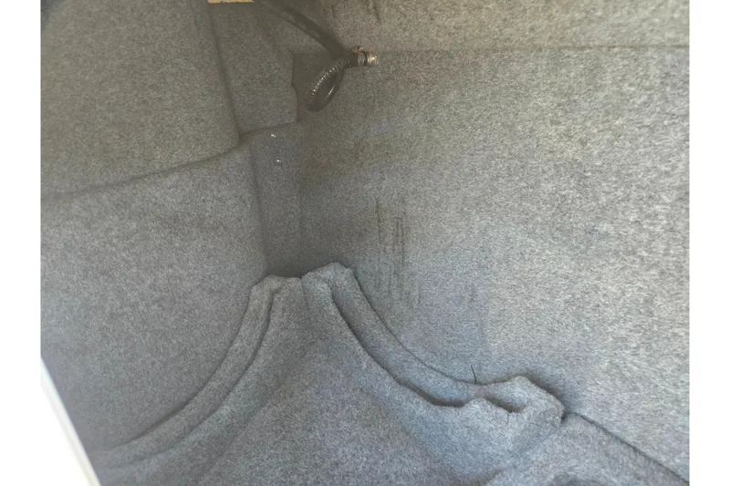 Slide: The Image of Interior view of 2005 Sea Ray 240 Sundeck boat storage compartment. - 24