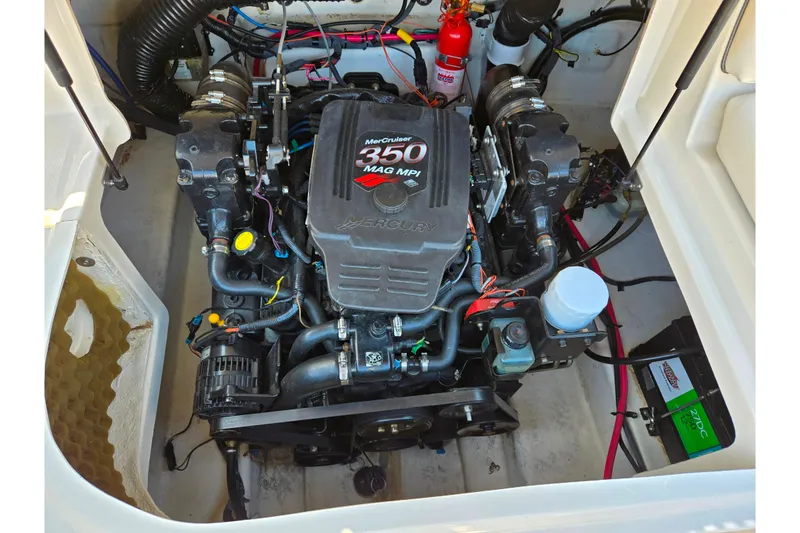 Slide: The Image of Engine compartment of a 2005 Sea Ray 240 Sundeck with MerCruiser 350 MAG MPI engine. - 25
