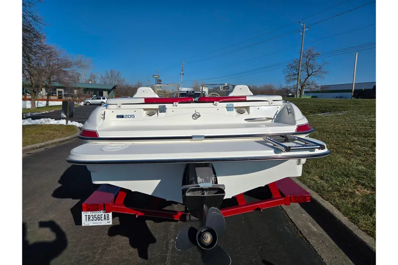 Slide: The Image of 2007 Glastron GT 205 Ski & Fish boat on trailer, rear view, sunny day. - 2