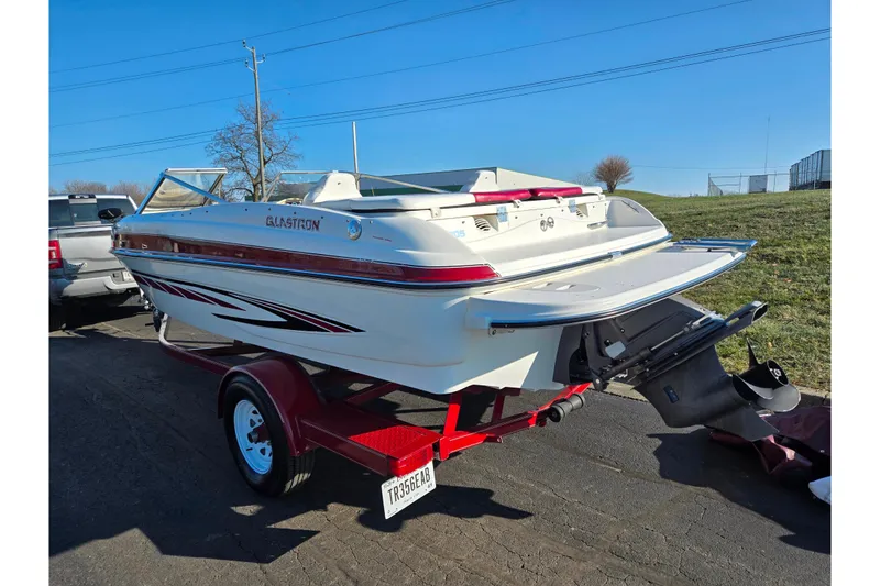 Slide: The Image of 2007 Glastron GT 205 Ski & Fish boat on trailer, parked outdoors. - 3