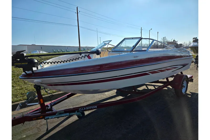 Slide: The Image of 2007 Glastron GT 205 Ski & Fish boat on trailer, red and white design. - 6