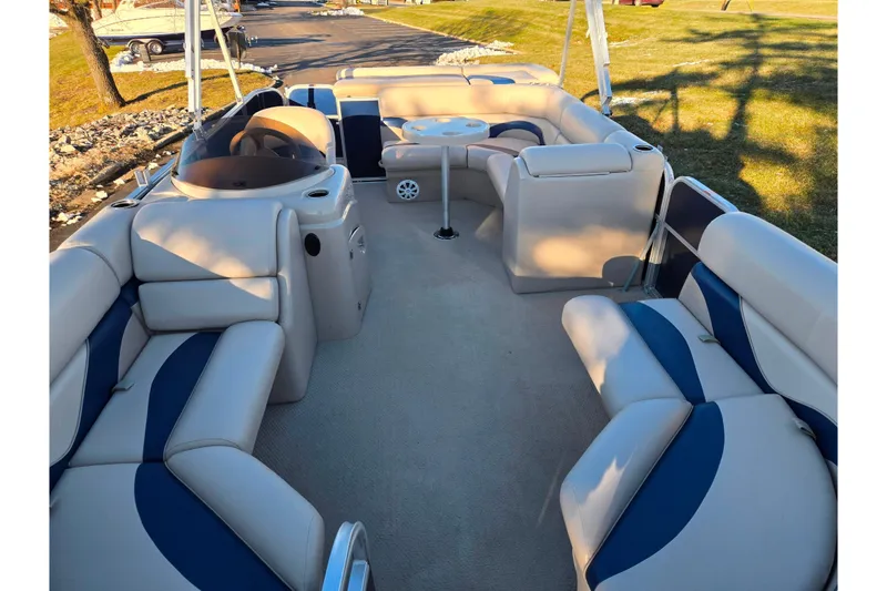 Slide: The Image of 2012 Berkshire 190CL LSR pontoon boat with spacious seating and elegant interior design. - 10