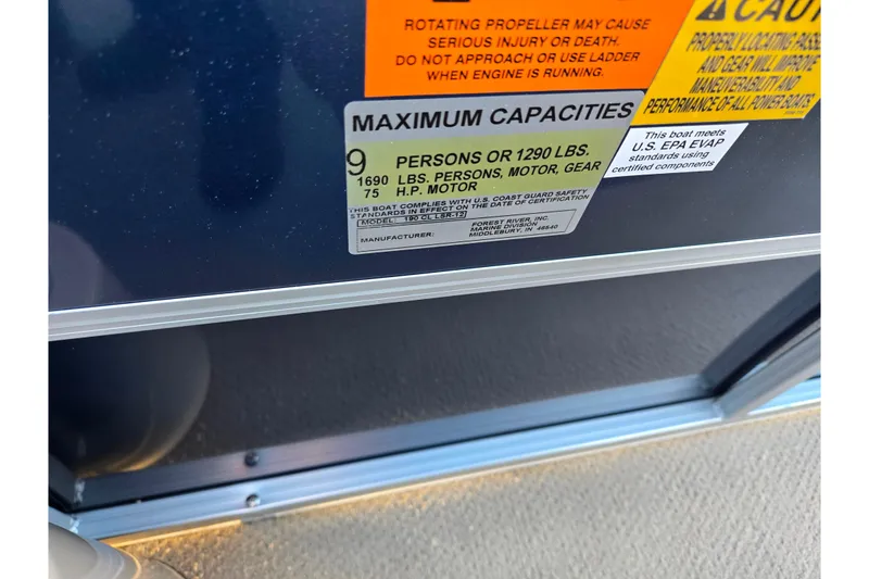 Slide: The Image of 2012 Berkshire 190CL LSR boat capacity label, maximum 9 persons or 1290 lbs. - 20