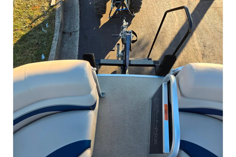 Slide: The Image of 2012 Berkshire 190CL LSR boat on trailer, viewed from above, showing seating and hitch. - 22