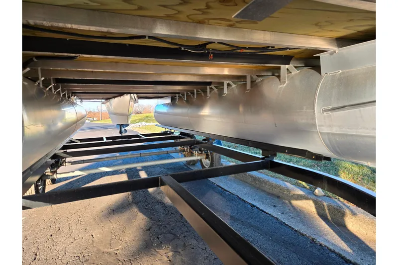 Slide: The Image of Underneath view of a 2012 Berkshire 190CL LSR pontoon boat on a trailer. - 7