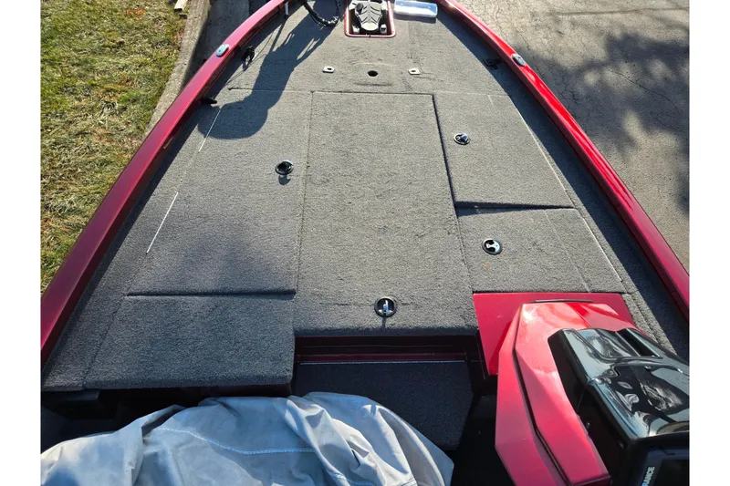 Slide: The Image of 2019 Vexus AVX1980 boat deck with red trim and carpeted surface. - 15