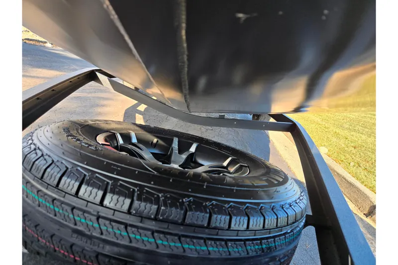 Slide: The Image of 2019 Vexus AVX1980 boat trailer with spare tire, close-up view. - 8