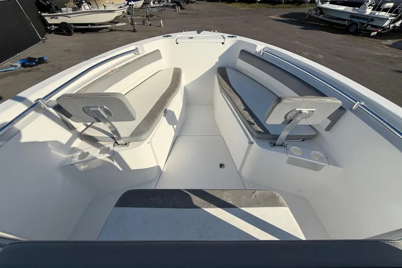 Slide: The Image of 2019 Release 208RX boat interior with seating and cup holders. - 36