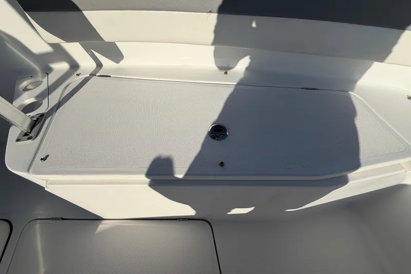 Slide: The Image of Interior view of a 2019 Release 208RX boat, featuring a storage compartment. - 40