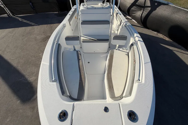 Slide: The Image of 2019 Release 208RX boat interior with seating and storage compartments. - 46