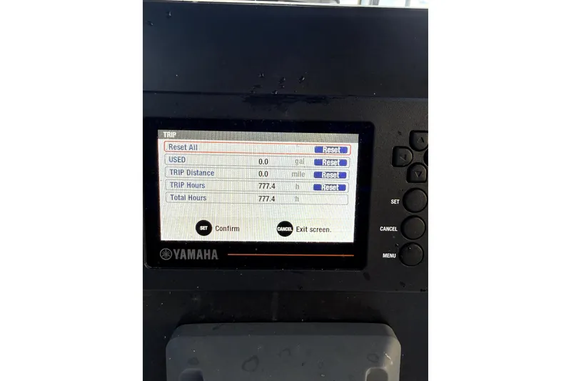 Slide: The Image of Outboard motor with "150" label on a 2019 Release 208RX boat, featuring Power-Pole Pro II. - 5