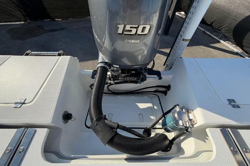 Slide: The Image of 2019 Release 208RX boat with Yamaha 150 engine and SeaStar hydraulic steering. - 66