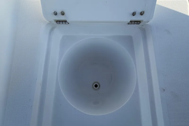 Slide: The Image of White compartment with round basin in 2019 Release 208RX boat. - 68
