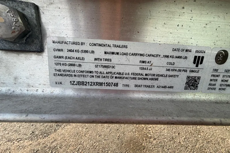 Slide: The Image of Trailer label showing specifications and compliance details, manufactured by Continental Trailers. - 73