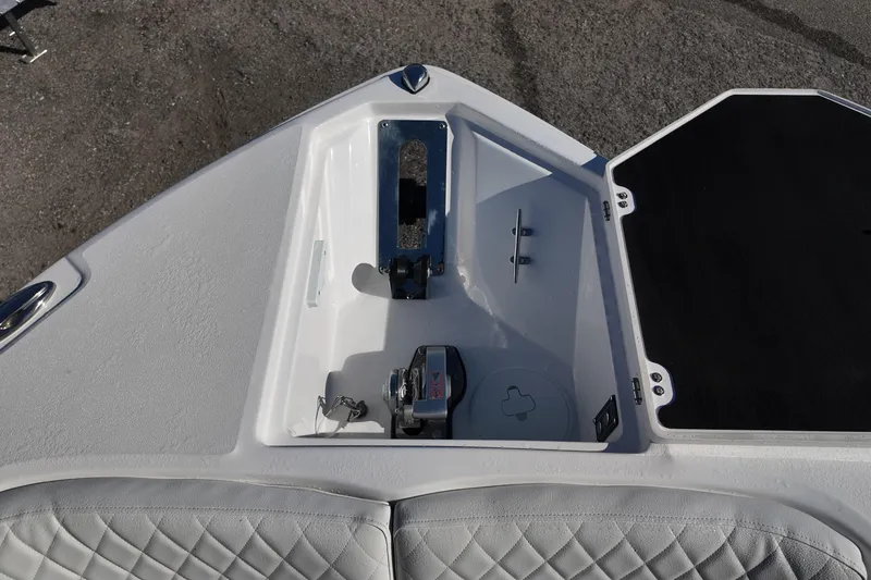 Slide: The Image of 2026 Sea Fox 268 Commander anchor compartment with storage and seating detail. - 19