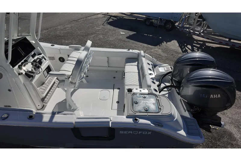 Slide: The Image of 2026 Sea Fox 268 Commander boat interior with dual Yamaha engines, featuring a sleek design. - 22