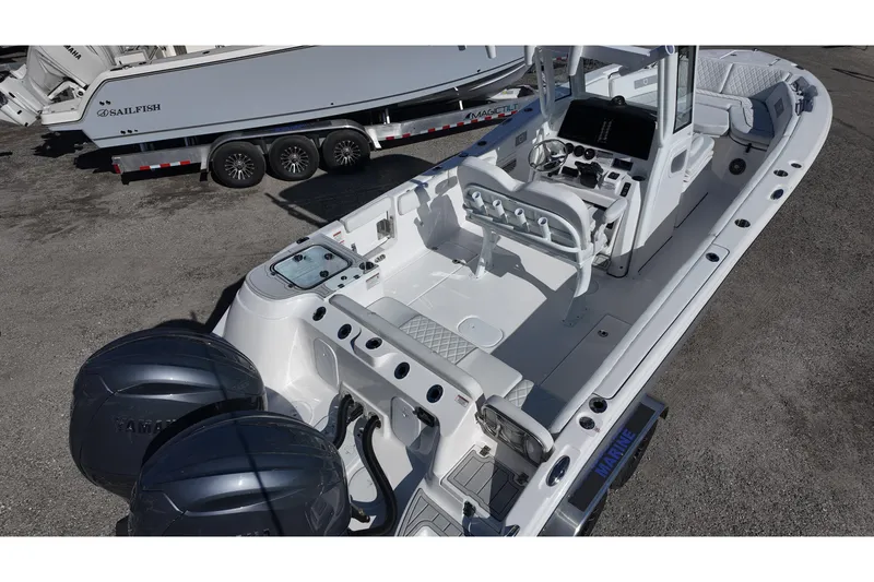 Slide: The Image of 2026 Sea Fox 268 Commander boat with dual Yamaha engines, spacious deck, and modern console. - 6