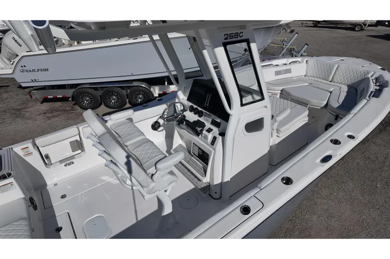 Slide: The Image of 2026 Sea Fox 268 Commander boat interior with modern seating and control panel. - 7
