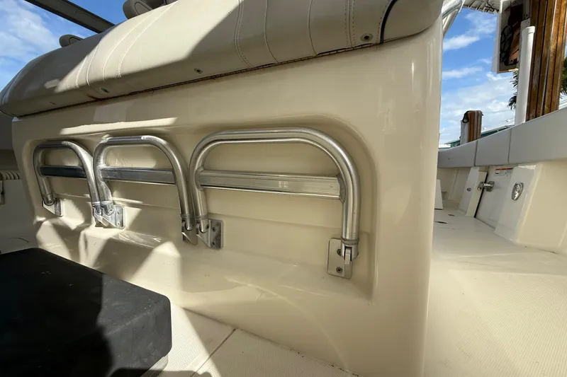Slide: The Image of 2019 SeaVee 390Z boat interior with cushioned seating at helm - 14