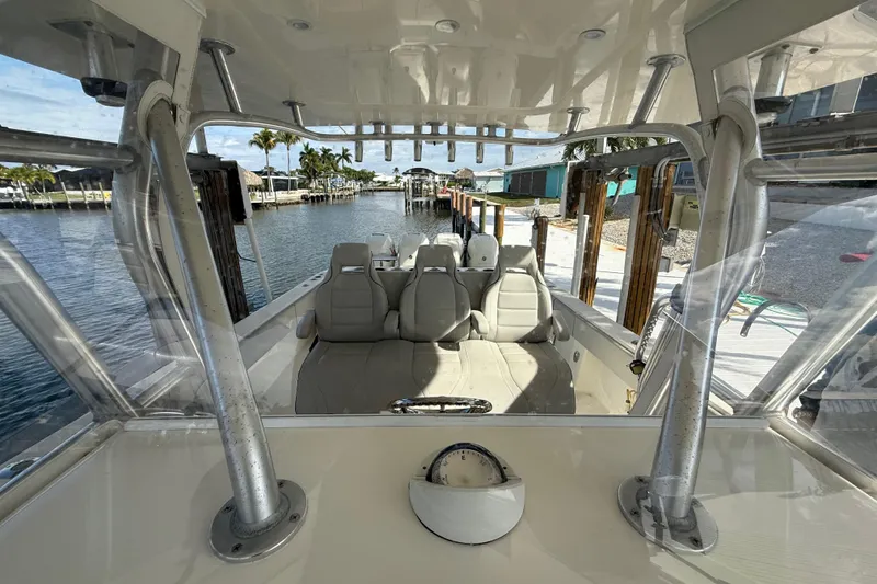 Slide: The Image of 2019 SeaVee 390Z boat interior with seating and compass on dash - 15
