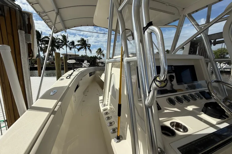 Slide: The Image of 2019 SeaVee 390Z boat interior with helm, controls, dual Garmin. - 16