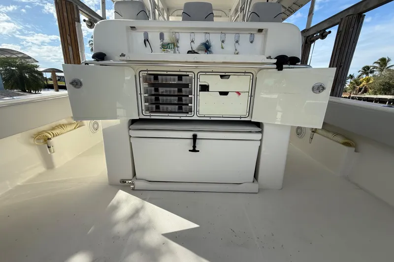 Slide: The Image of 2019 SeaVee 390Z with Fridged Ridged stowed and compartments with fishing gear. - 20