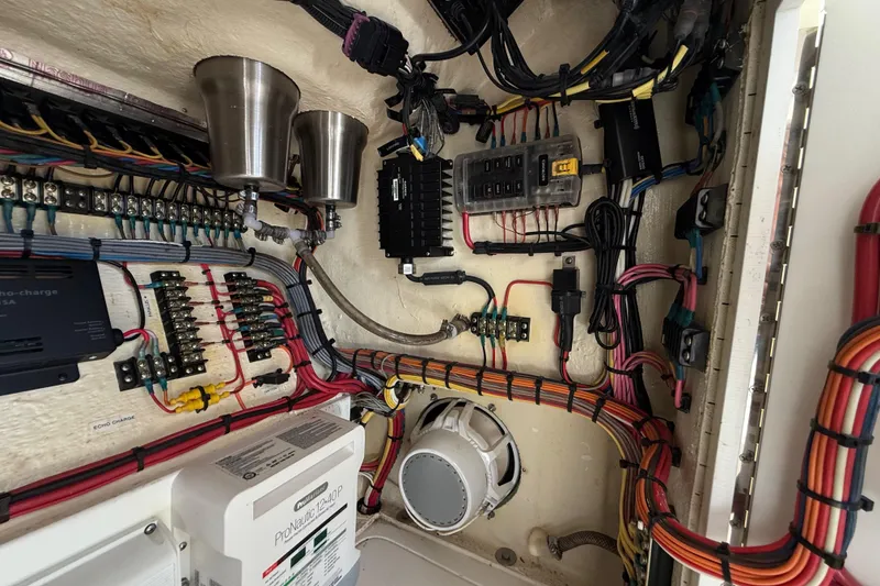 Slide: The Image of Electrical wiring and components under console - 43