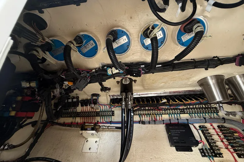 Slide: The Image of Electrical system with wiring and components in a boat's interior. - 46