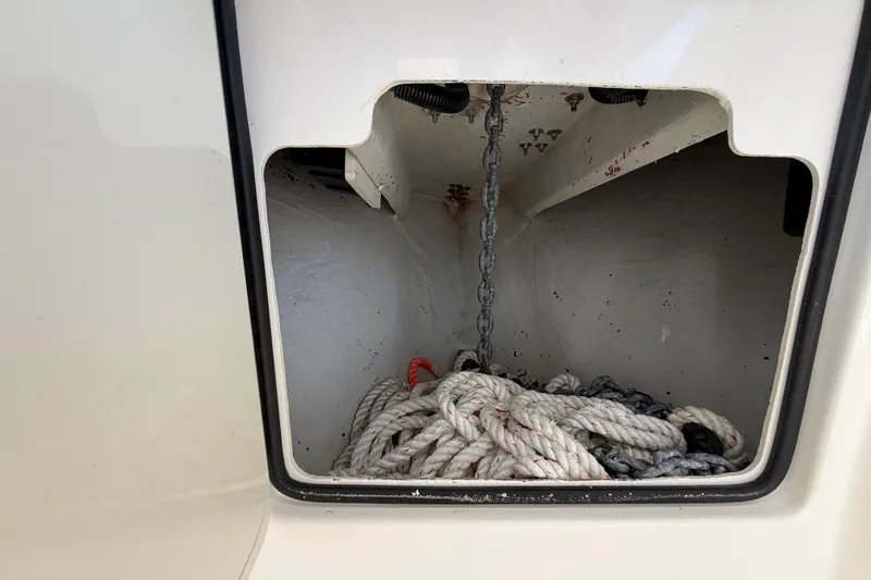Slide: The Image of Anchor locker of 2019 SeaVee 390Z boat with rope and chain. - 52