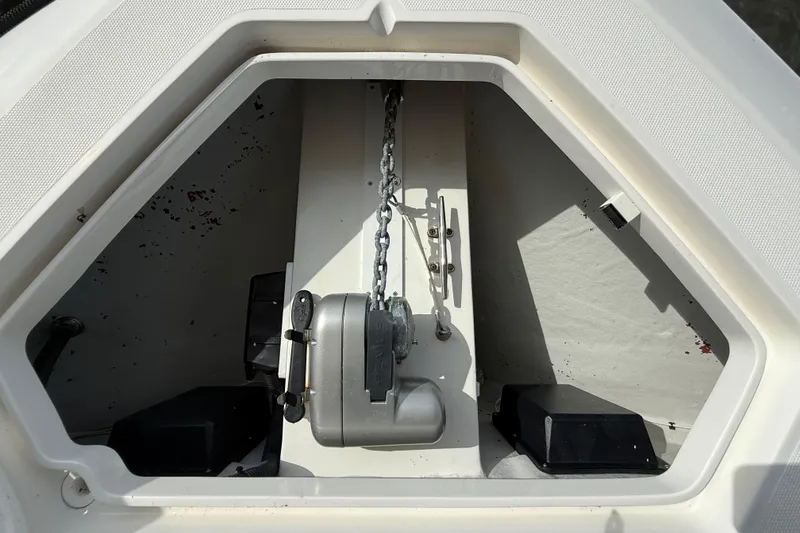 Slide: The Image of Anchor compartment of 2019 SeaVee 390Z boat with chain and winch. - 54