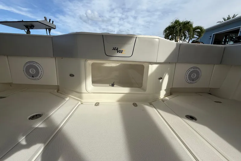 Slide: The Image of 2019 SeaVee 390Z boat interior with speakers and storage compartment. - 65