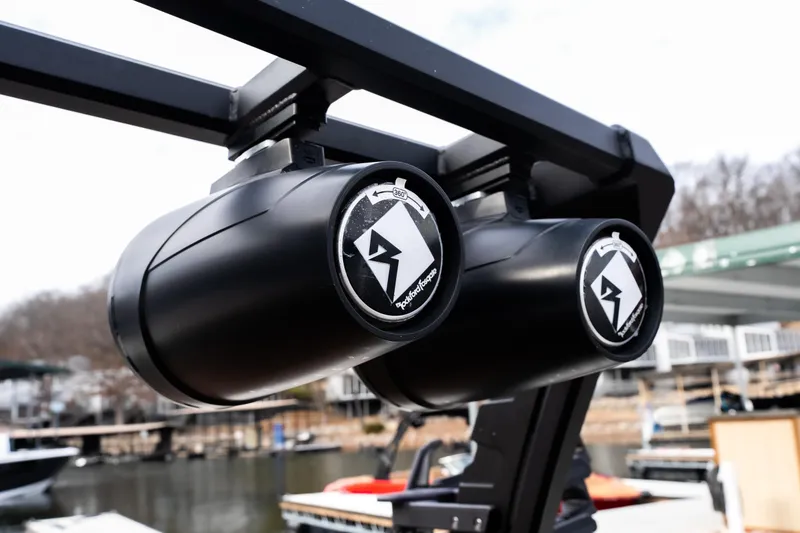 Slide: The Image of Close-up of Anthem Assault ST23 speakers on a boat, dockside view. - 15