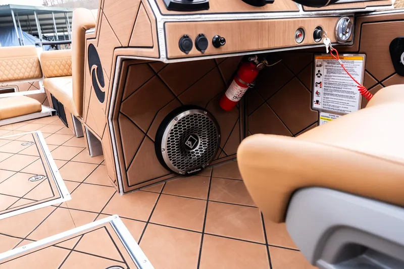 Slide: The Image of Interior of 2026 Anthem Assault ST23 boat with speaker and fire extinguisher. - 16
