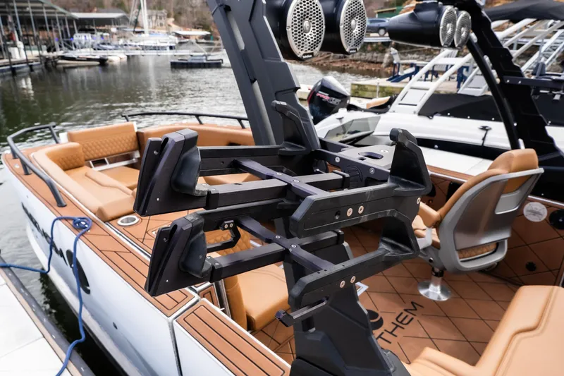 Slide: The Image of Luxury Anthem Assault ST23 boat interior with advanced equipment, docked at a marina, 2026 model. - 2