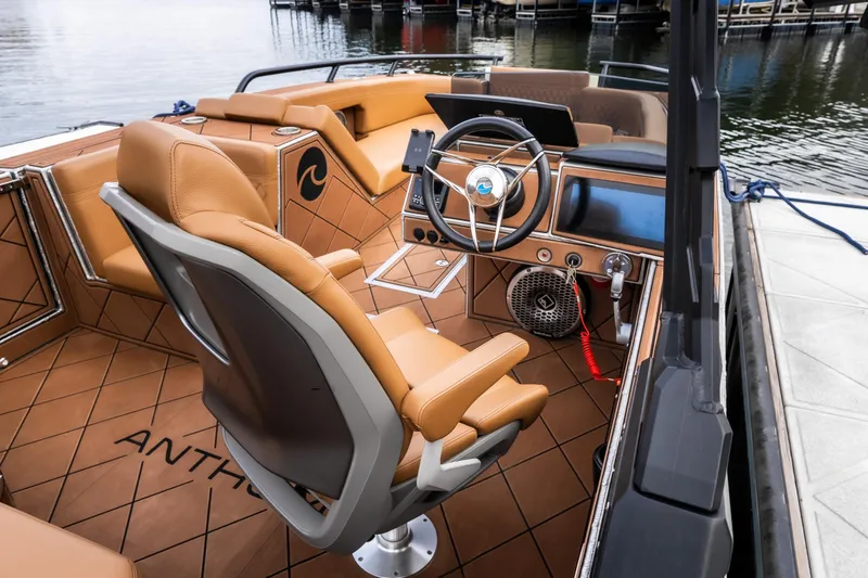 Slide: The Image of Interior of 2026 Anthem Assault ST23 boat with luxurious seating and modern dashboard. - 9